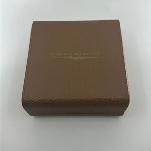 New/unused. Taylor Madison travel jewelry box. Faux leather.